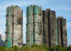 Панихида почита жертвите на жилищния пожар в Хонконг